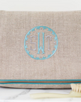 Kris Case, in linen or plastic-coated cotton, custom monogram, 11 in. by 9.5 in.